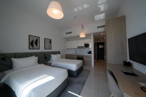 Capital Suites Hotel & Residences Room Type - Twin Room with City View
