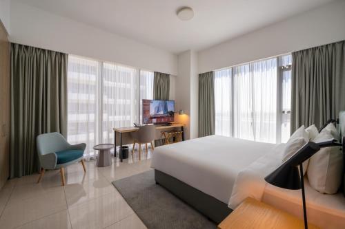 Capital Suites Hotel & Residences Room Type - One Bedroom City view King Bed
