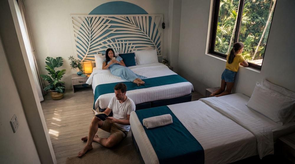KUE Hotel Maafushi Room Type - Deluxe Quadruple Room, Pool View