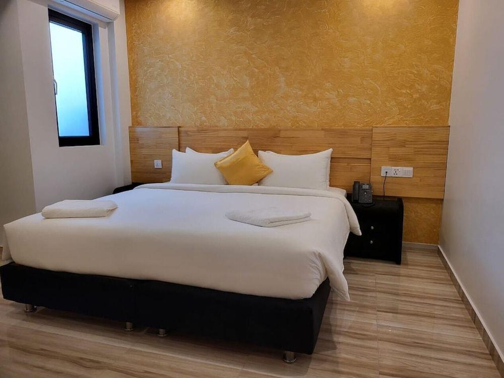 AIMI Beach Hotel - Tap to explore photos