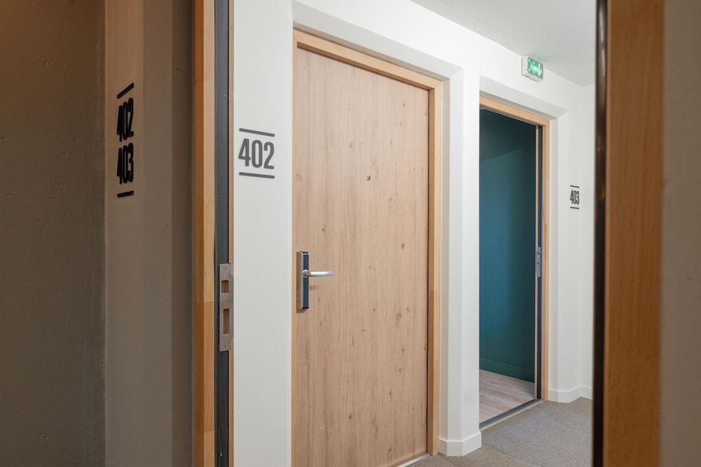 All Suites Hôtel | Paris Pleyel – L’île Saint Denis Room Type - SUITE TWO CONNECTED ROOMS (DOUBLE AND TWIN)
