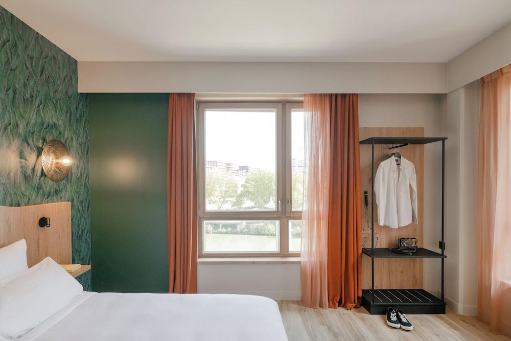 All Suites Hôtel | Paris Pleyel – L’île Saint Denis - Tap to explore photos