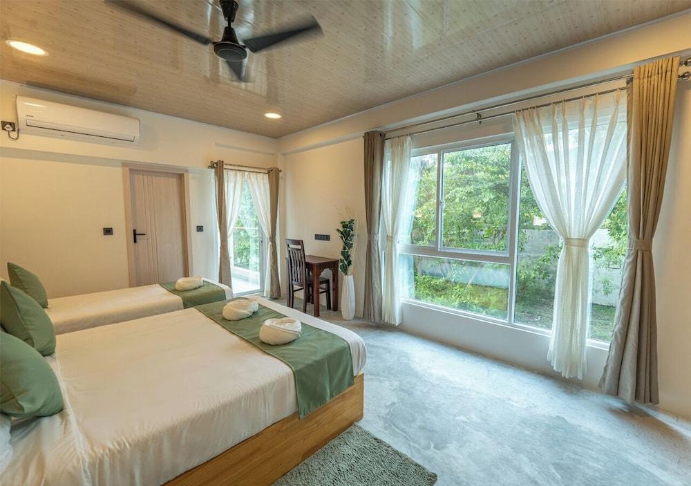 Blissview Maldives Room Type - Deluxe Triple Room, City View