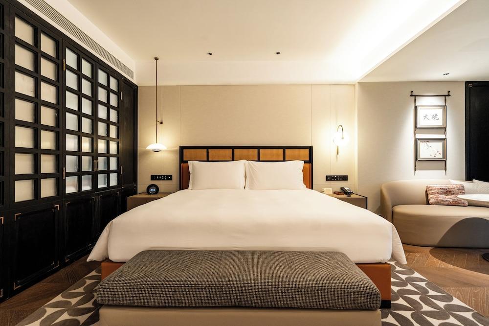 Jingyuan Aroma Garden Hotel - Tap to explore photos