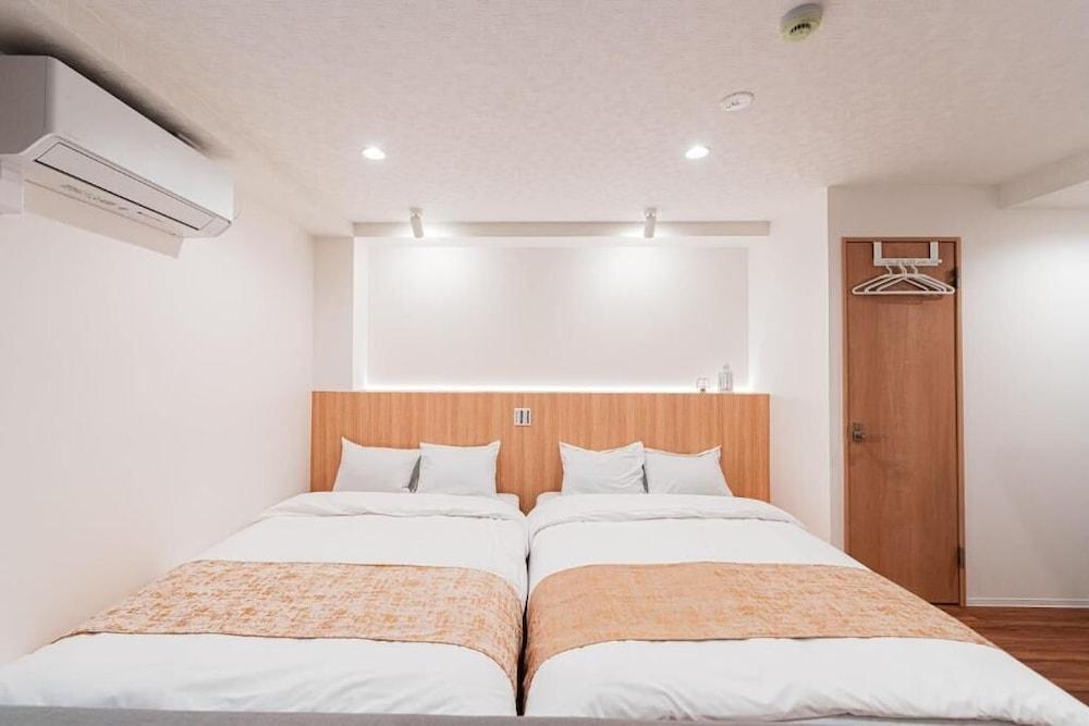 SAIEI HOTEL Room Type - Senior Apartment, Multiple Beds, City View