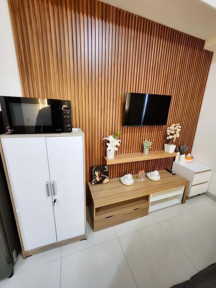 Sedayu City Suites - Free Gym Pool - Tap to explore photos