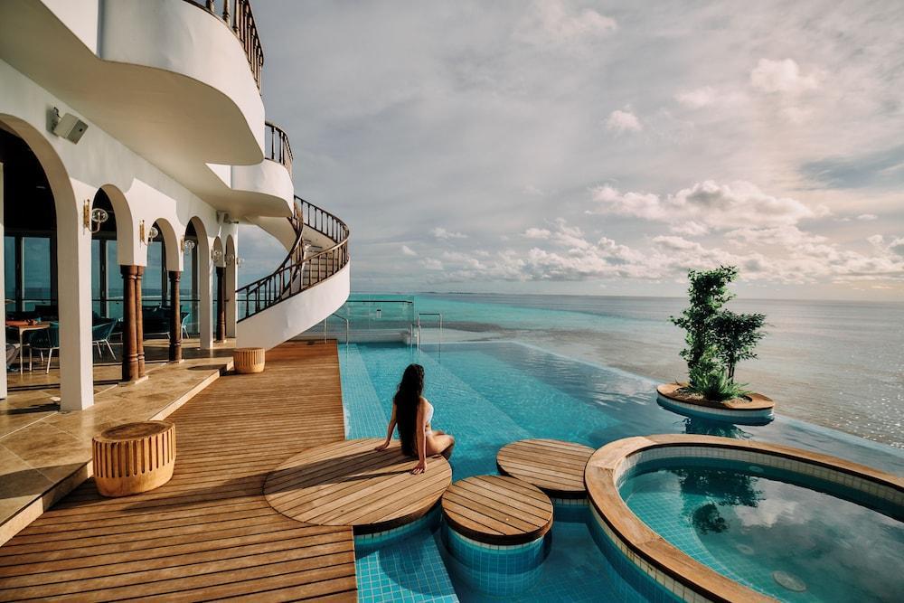 Stone Hotel Dhiffushi - Tap to explore photos
