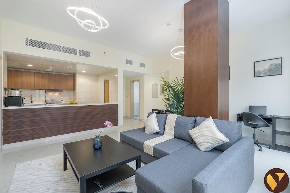 Spacious Pulse Smart Residence JVC - Tap to explore photos