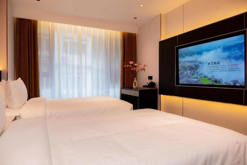 Jiuding Joy Hotel Room Type - Deluxe Twin Room