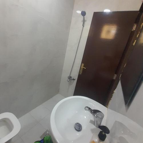 Studio 1 room and washroom and kitchen - Tap to explore photos