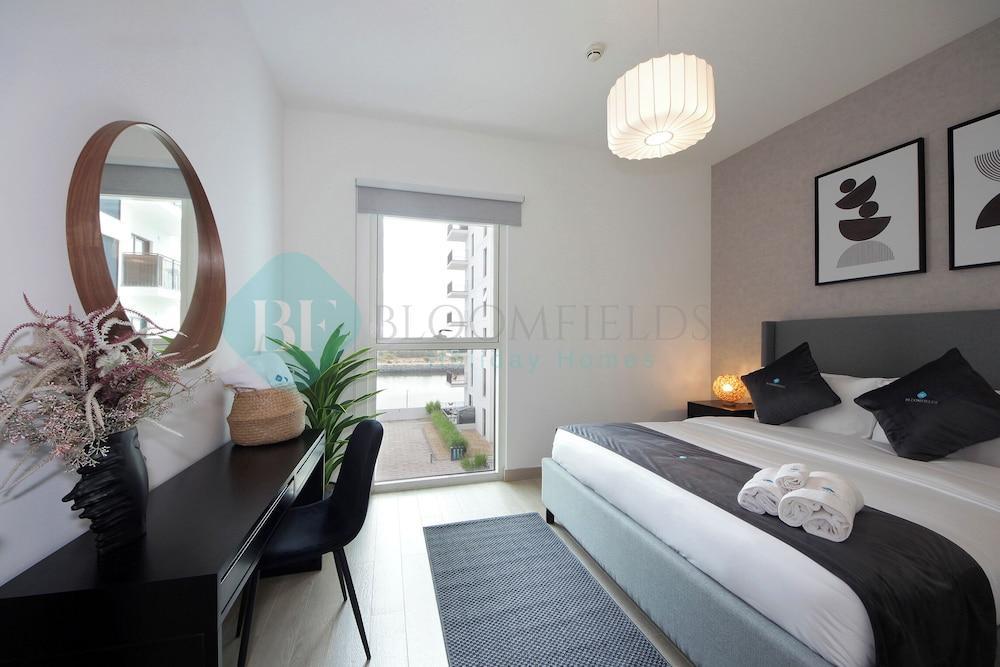 Bloomfields 1BR Canal View in Water Edge - Tap to explore photos