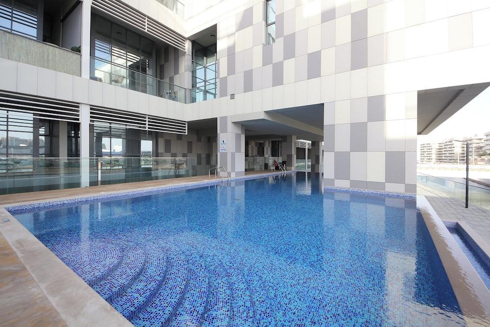 Bloomfields Luxury 2BR Duplex Raha Loft - Tap to explore photos