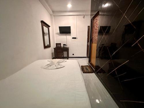 Ez Stay Guesthouse - Tap to explore photos