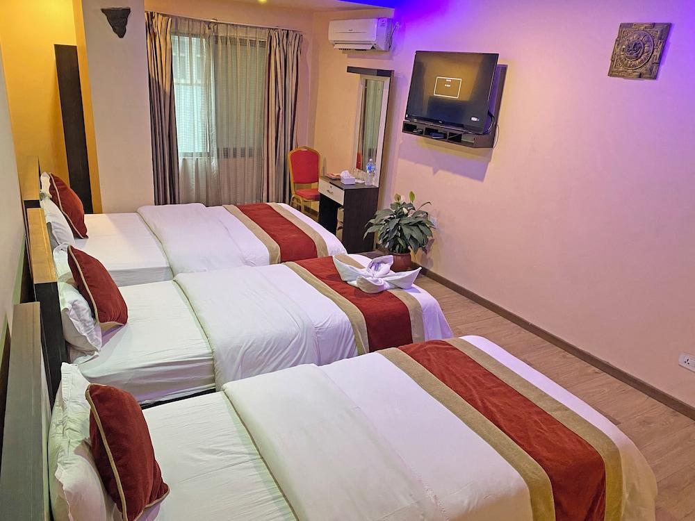 Hotel Readers Inn Pvt.Ltd Room Type - Deluxe Triple Room, City View