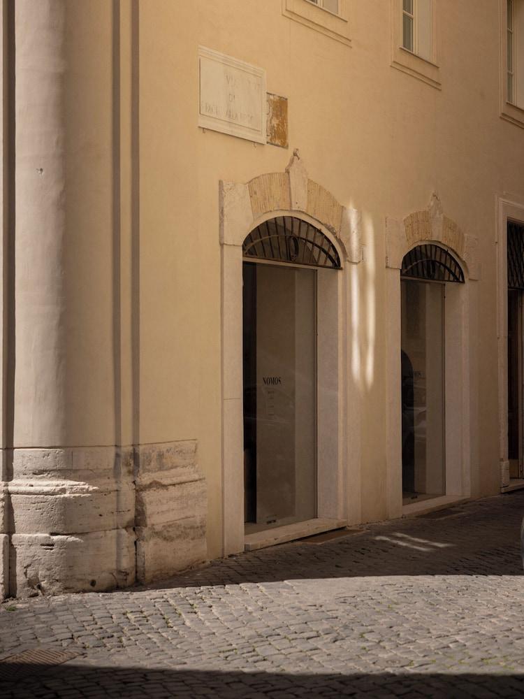 Nomos Hotel - Tap to explore photos