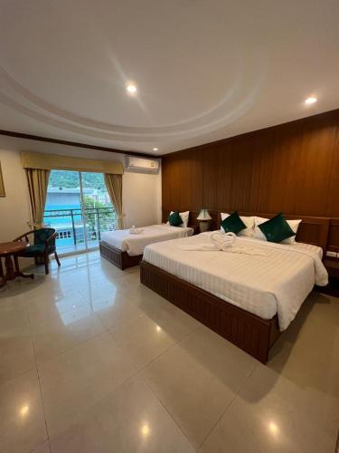 SK Residence And Restaurant Patong - Tap to explore photos