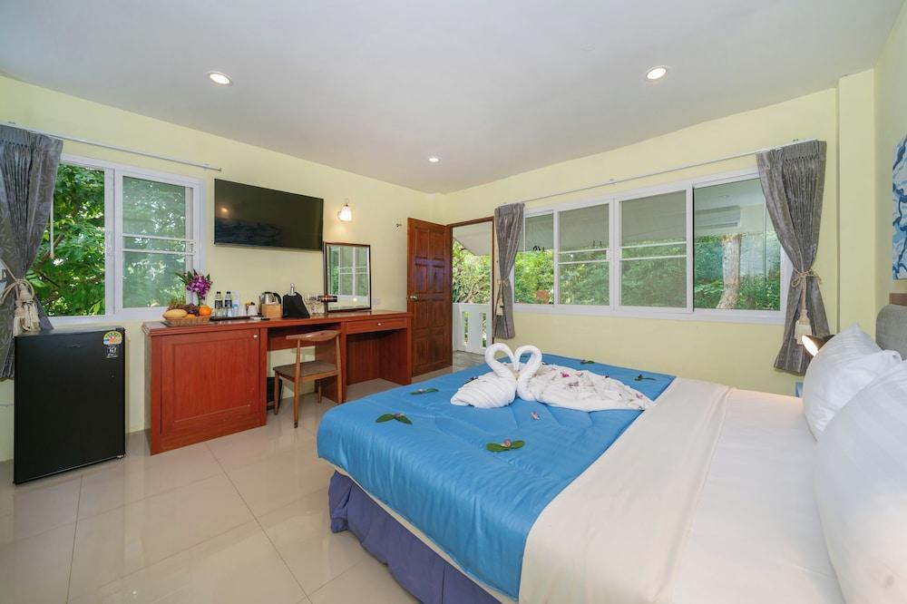 Oceanview Bungalows by EAT, Karon Beach - Tap to explore photos