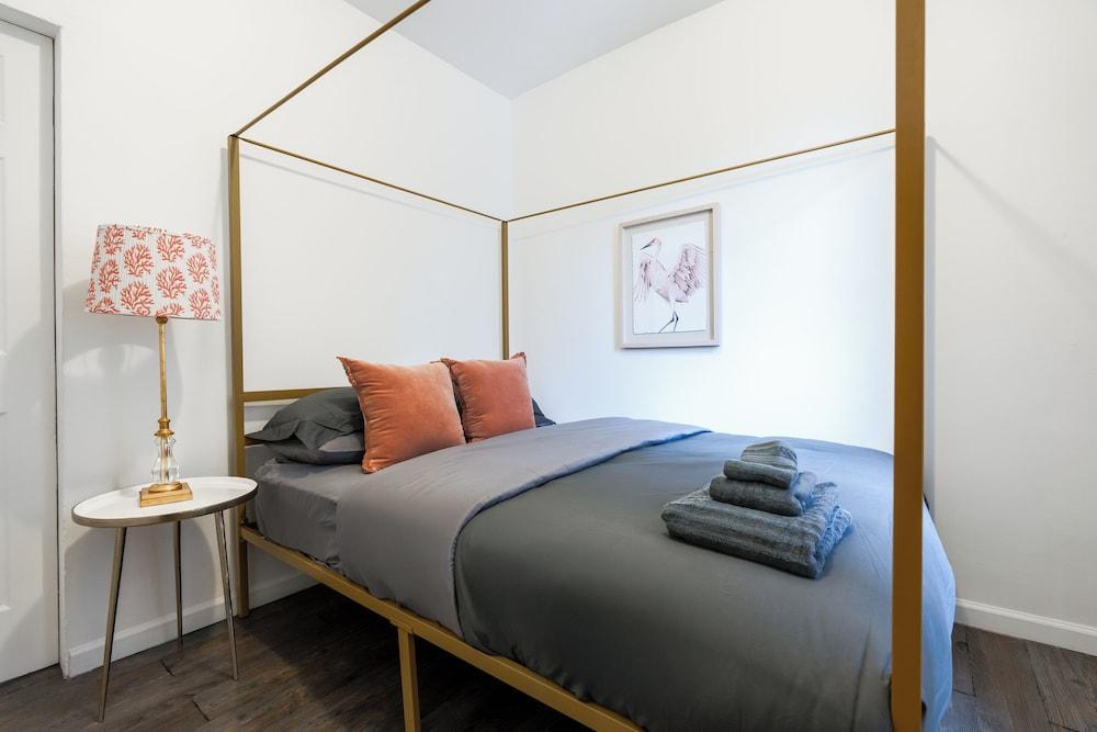 Elegant Harlem Suites - Tap to explore photos
