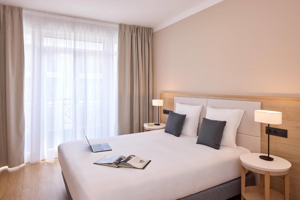 Quality Aparthotel Val d'Europe Room Type - 4 adults - 1 double bed and 1 sofa bed