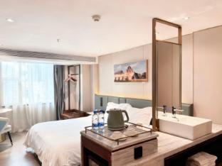 Fei Hotel (Tianhebei Branch) - Tap to explore photos