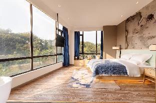 ANJI LIGHT LUXURY HOTEL 安季轻奢酒店 - Tap to explore photos