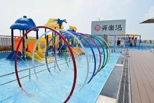 Qiletang Hot Spring Hotel - Tap to explore photos