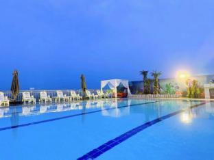 Qiletang Hot Spring Hotel - Tap to explore photos