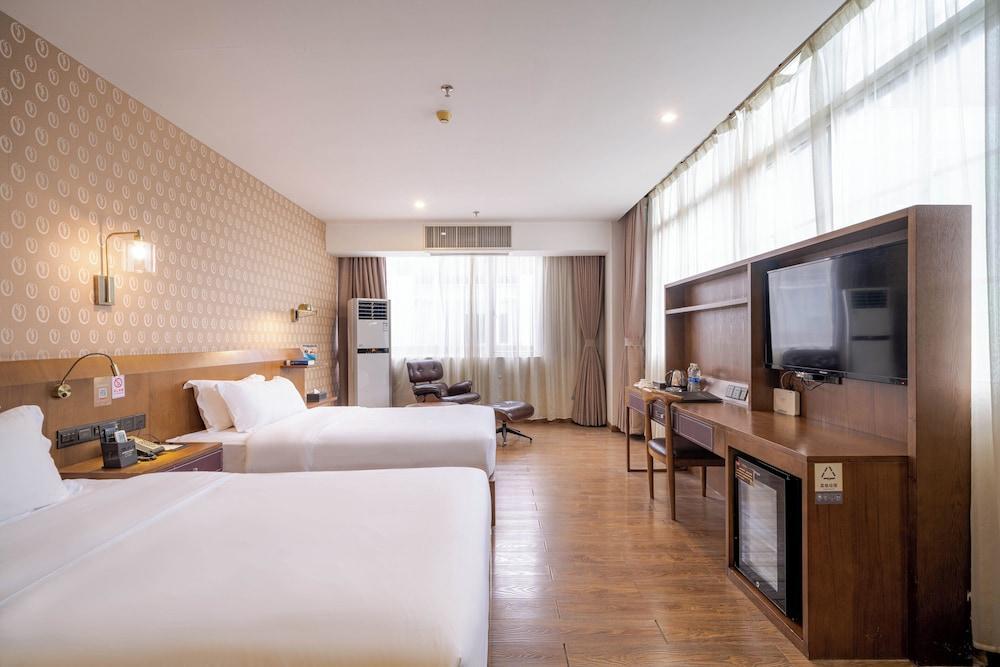 Xingyi Chain Hotel Jiangxia Metro Station Room Type - Superior Twin Room, City View