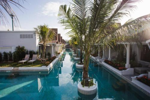 Lalynn Resort & Villas, Phuket - Free scheduled shuttle from Hotel to Phuket Airport - Tap to explore photos