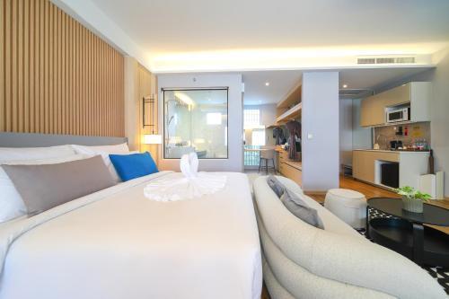 Lalynn Resort & Villas, Phuket - Free scheduled shuttle from Hotel to Phuket Airport - Tap to explore photos