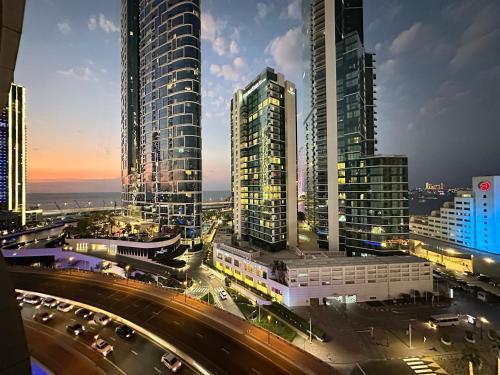 Opulent Flat with Beach, Pool & Canal View in JBR - Tap to explore photos