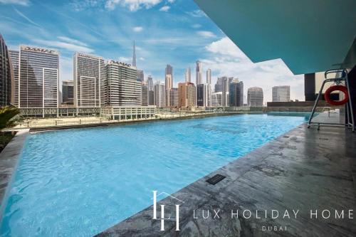 LUX The Modern Binghatti Canal Suite 2 - Tap to explore photos