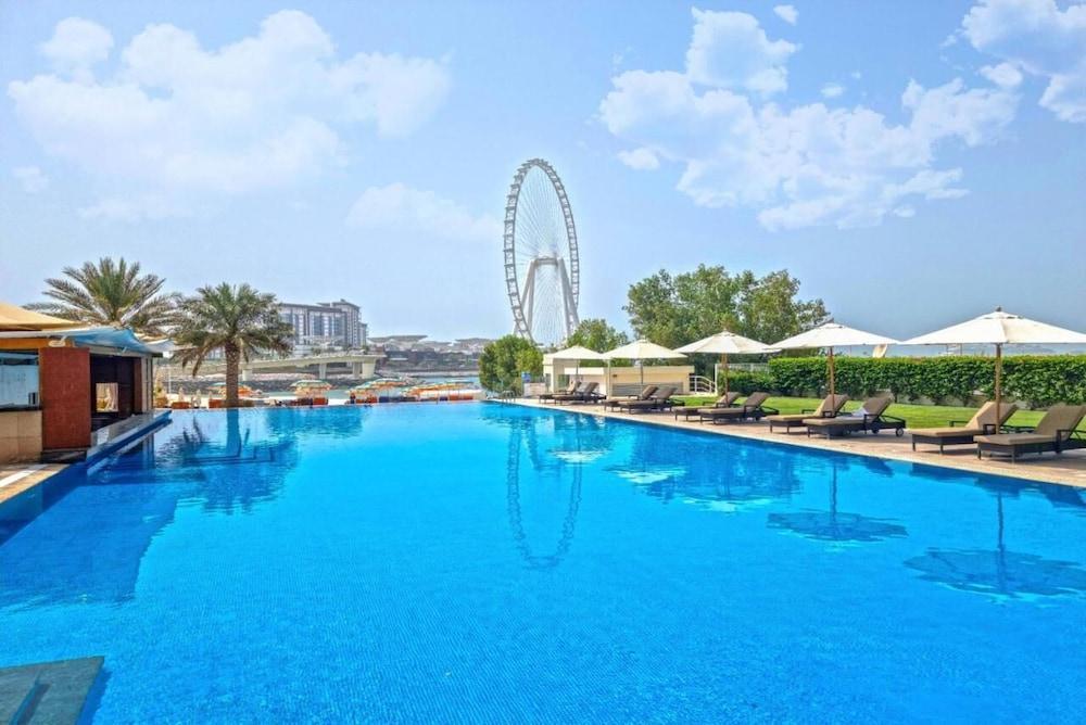 HAPPY SEASON I Al Bateen Residences - Tap to explore photos