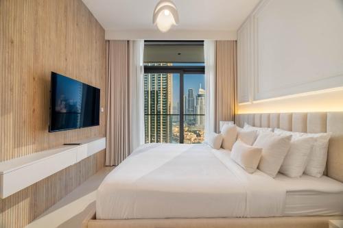 Luxurious 4BR with Boulevard View - 10 min to Burj & Mall - Tap to explore photos
