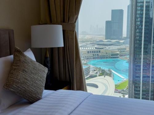 Downtown Gem Apt, Burj View Bliss - Tap to explore photos