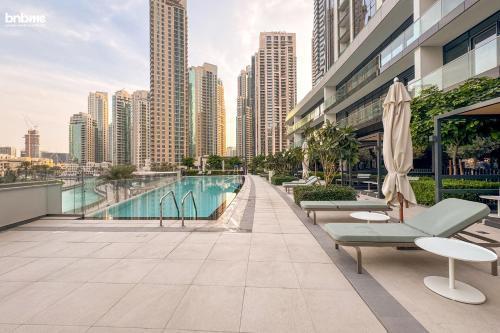 bnbmehomes - Grande Signature Residences - Tap to explore photos