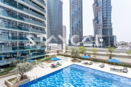 Staycae Holiday Homes - Merano Tower, Business Bay - Tap to explore photos