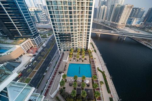 White Sage - Designer Studio with Canal View & Largest Balcony - Tap to explore photos