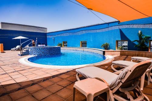 Grand Bellevue Hotel Apartment Dubai - Tap to explore photos