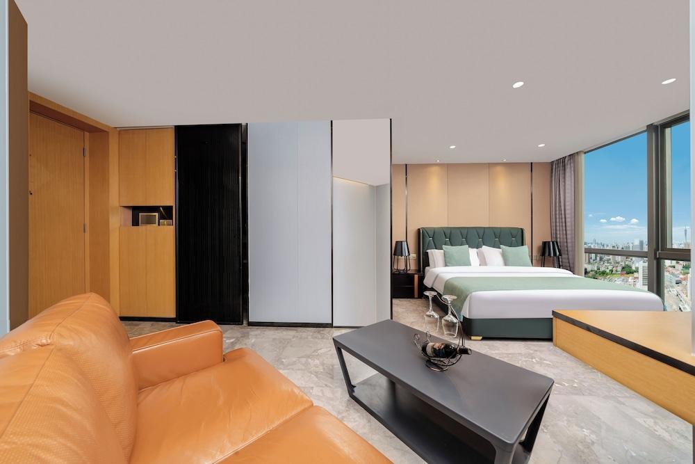 Weekend International Apartment- Beijing Rd A-mall - Tap to explore photos