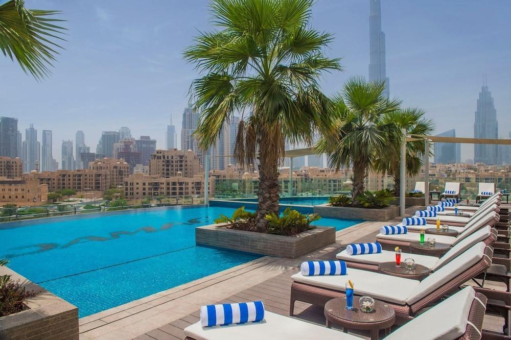 Cozy 1BR with balcony Damac Towers - Tap to explore photos