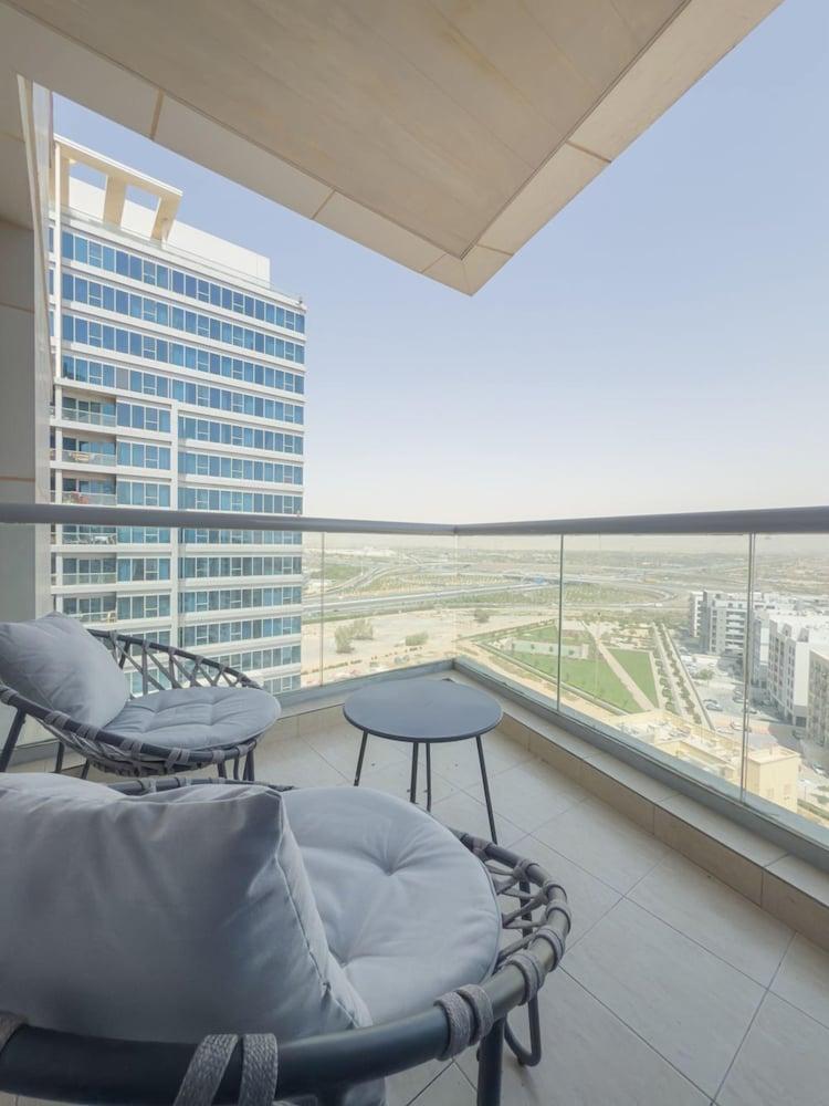 Iconic 2BR in Skycourt Dubailand - Tap to explore photos