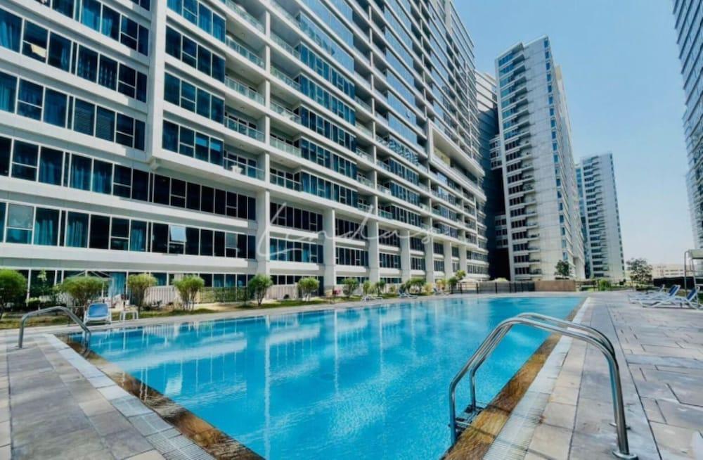 Iconic 2BR in Skycourt Dubailand - Tap to explore photos