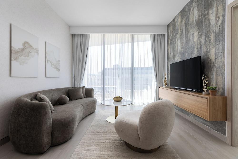 Waves - Urban Chic 1BR Apt With Maid - Tap to explore photos