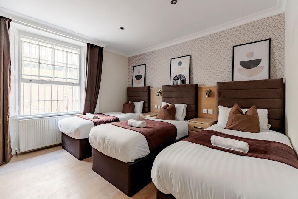 Mina Hotel by PLI Room Type - Triple Room, Ensuite