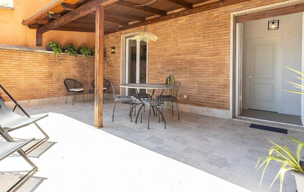 Rental in Rome Constance Terrace Apartment - Tap to explore photos
