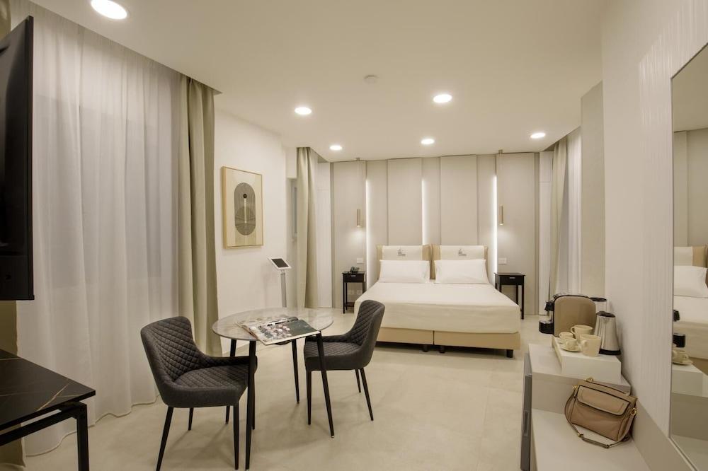 Cosmo Vatican Rooms - Tap to explore photos