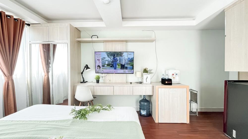 Minimalist And Homey Studio Apartment Amethyst - Tap to explore photos