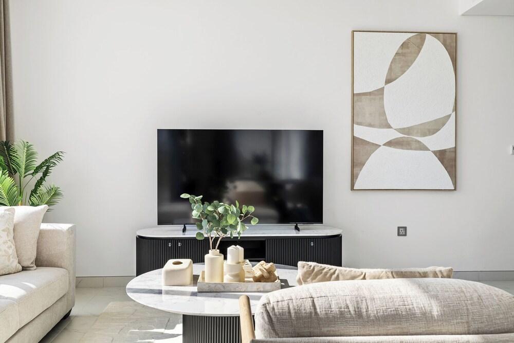 Refined 2BR Apartment District One MBR - Tap to explore photos