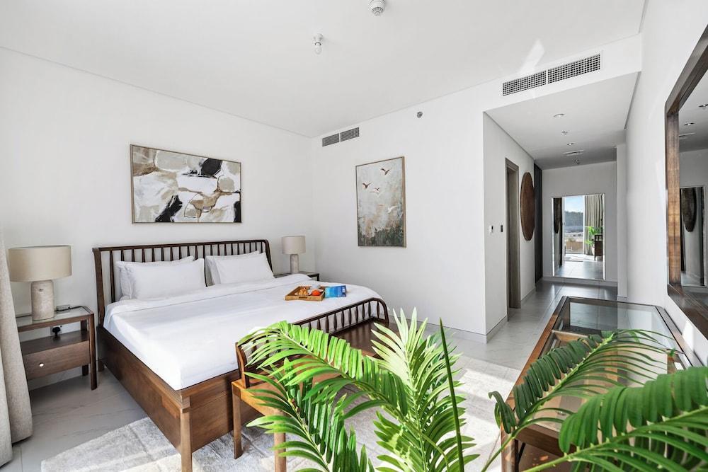 Refined 2BR Apartment District One MBR - Tap to explore photos